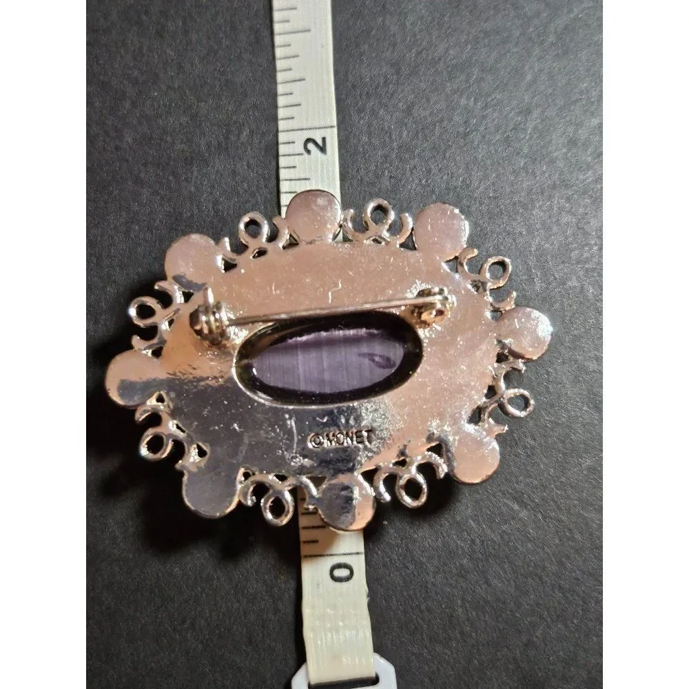 Monet vintage purple rhinestone brooch